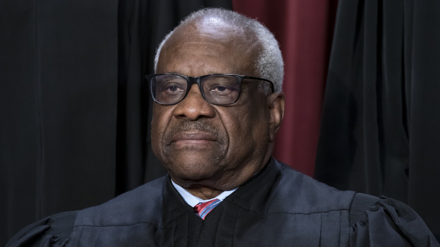 Justice Clarence Thomas reports he took 3 trips on Republican donor’s plane last year | AP News