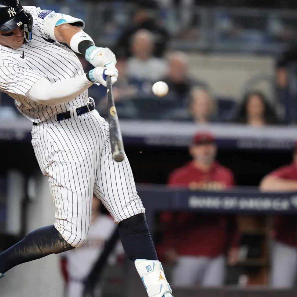 Judge hits 3 home runs, becomes first Yankees player to do it twice in one season | AP News