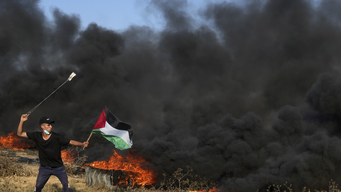 Israel strikes Gaza for the second time in two days after Palestinian violence | AP News