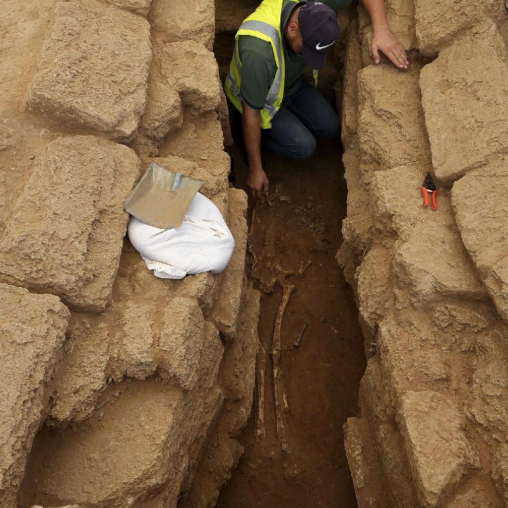 Archaeologists unearth the largest cemetery ever discovered in Gaza and find rare lead sarcophogi | AP News