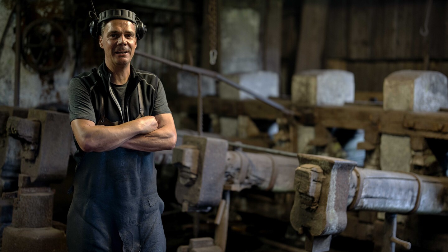 AP PHOTOS: Bavarian hammersmith forges wrought-iron pans at a mill more than 500 years old | AP News