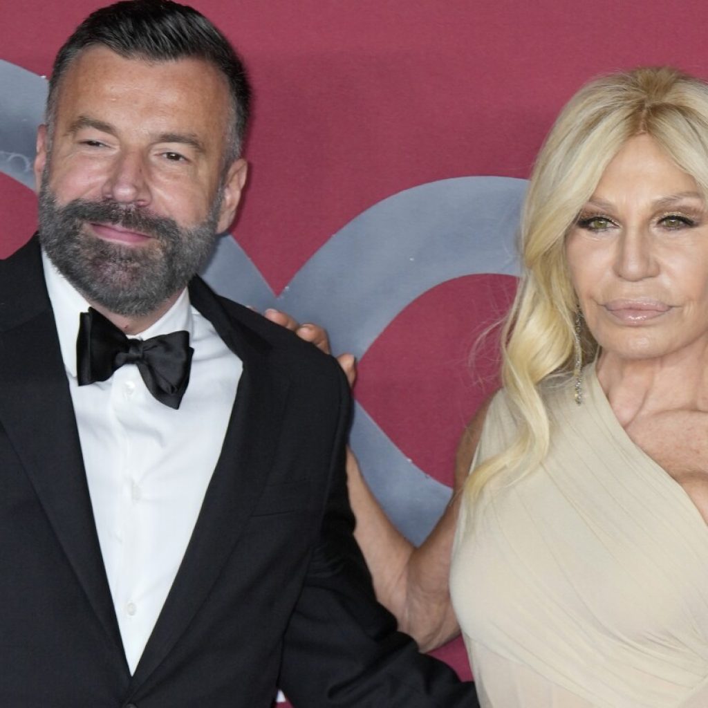 Donatella Versace slams Italian government’s anti-gay policies from La Scala stage | AP News