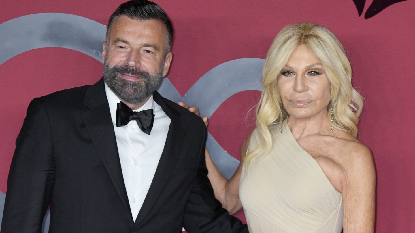 Donatella Versace slams Italian government’s anti-gay policies from La Scala stage | AP News