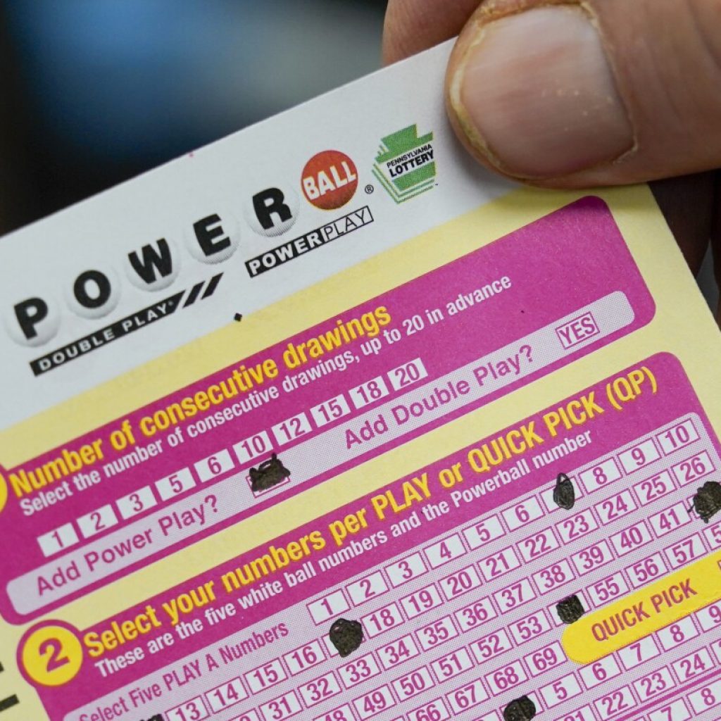 Powerball jackpot rises to $925 million after another drawing without a big winner | AP News