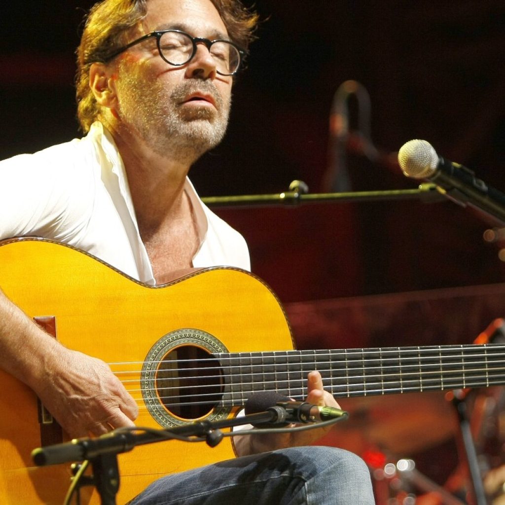 US guitarist Al Di Meola suffers a heart attack in Romania but is now in a stable condition | AP News