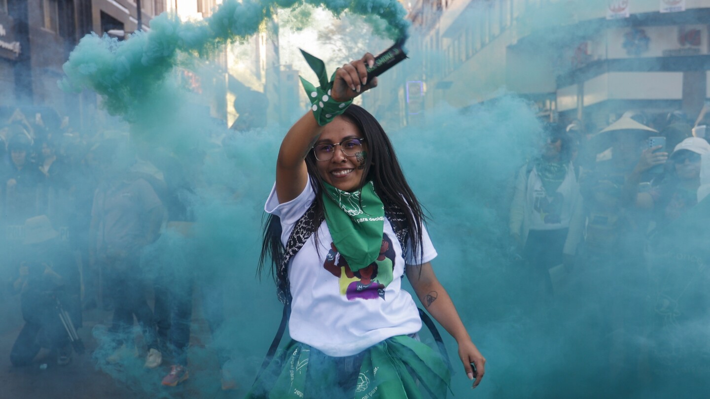 Thousands of women march in Latin American cities calling for abortion rights | AP News