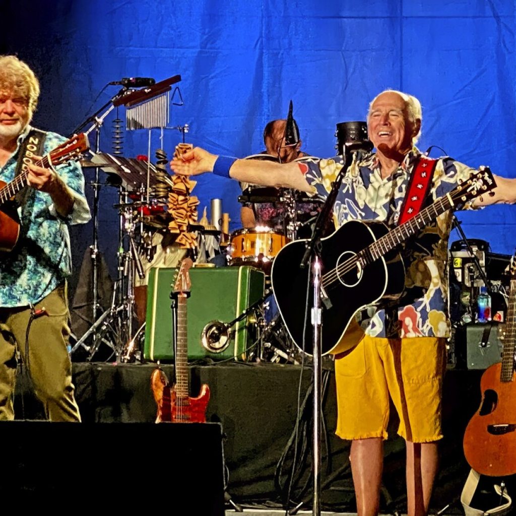 Americans have long wanted the perfect endless summer. Jimmy Buffett offered them one | AP News