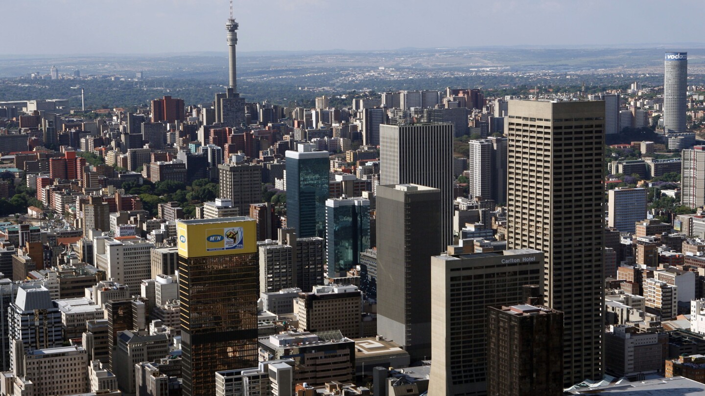 A building marked by fire and death shows the decay of South Africa’s ‘city of gold’ | AP News