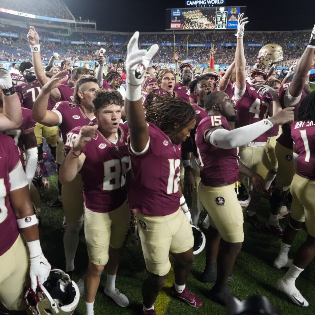 Jordan Travis accounts for 5 TDs and No. 8 Florida State thumps No. 5 LSU 45-24 in marquee matchup | AP News