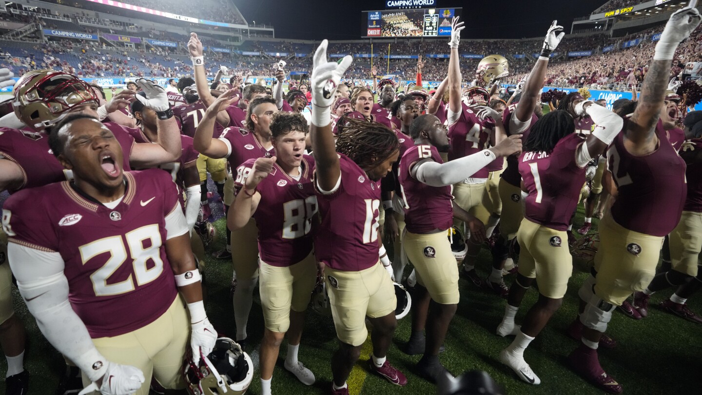 Jordan Travis accounts for 5 TDs and No. 8 Florida State thumps No. 5 LSU 45-24 in marquee matchup | AP News