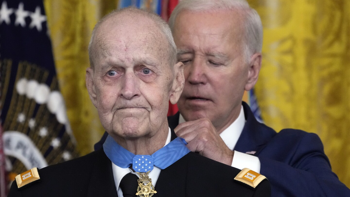 Biden awards Medal of Honor to Army helicopter pilot who rescued soldiers during Vietnam War | AP News