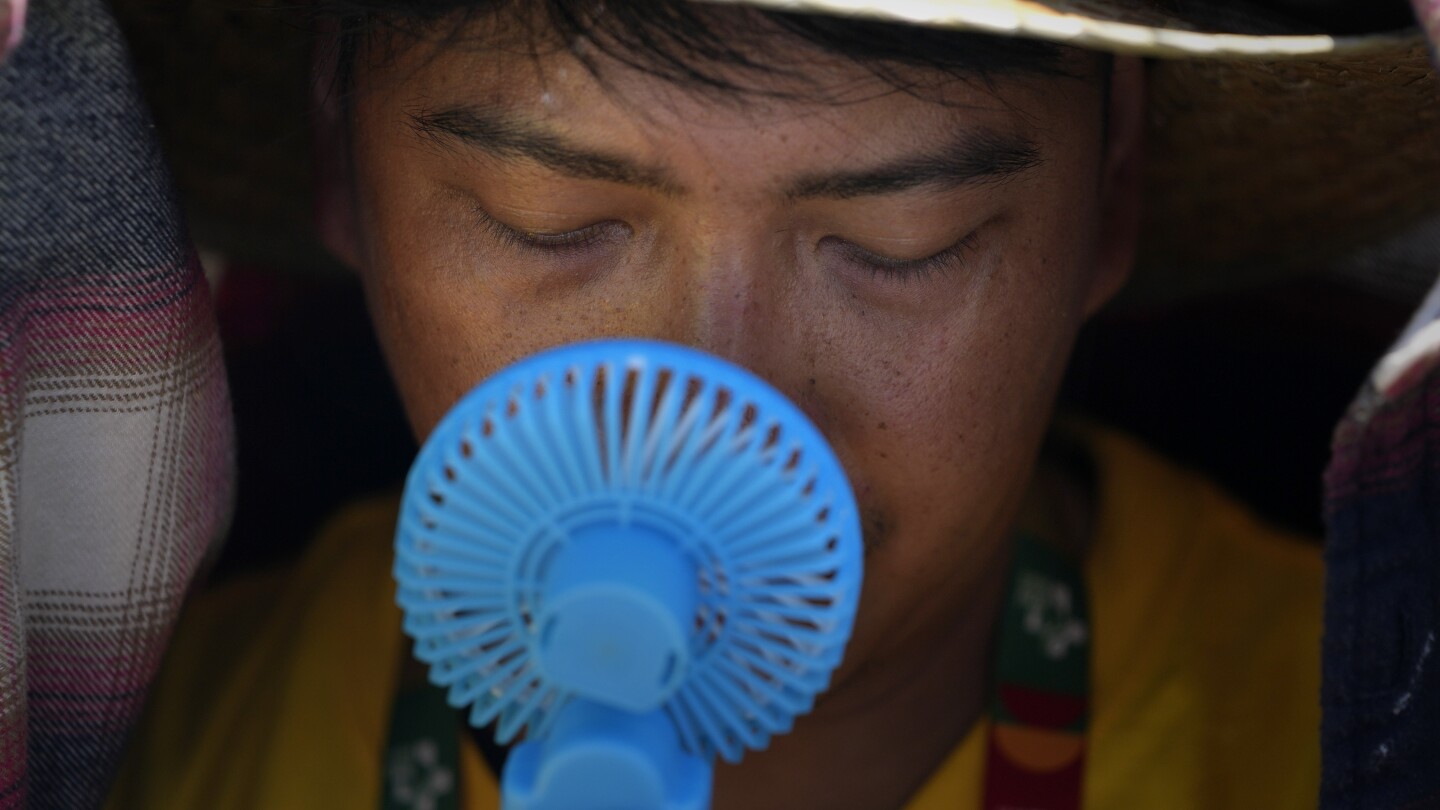 It’s official. Meteorologists say this summer’s swelter was a global record breaker for high heat | AP News