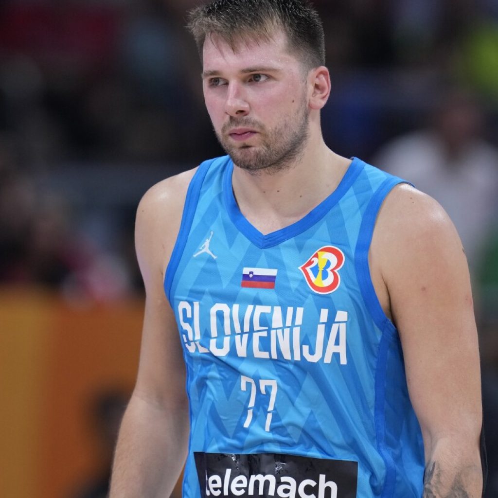 Doncic ejected and Canada tops Slovenia in World Cup. Germany and Serbia make the Olympics | AP News