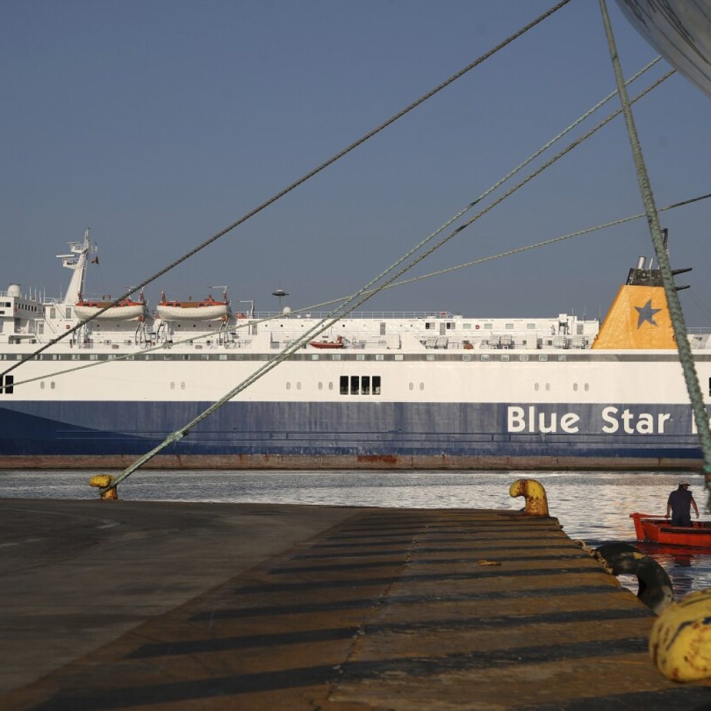 Greek ferry captain, 3 seamen charged over death of tardy passenger pushed into sea by crew member | AP News