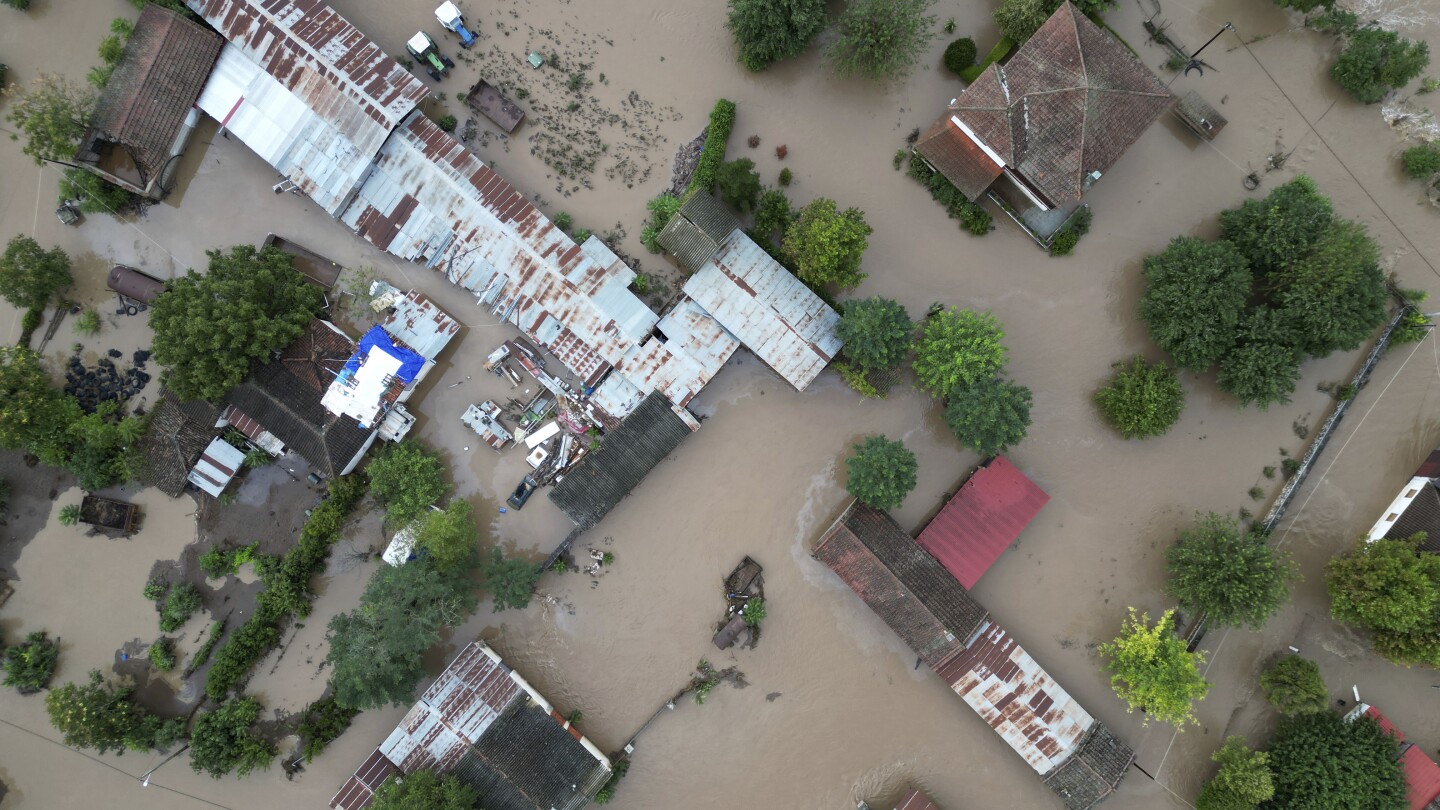 Severe flooding in Greece leaves at least 6 dead and 6 missing, villages cut off | AP News