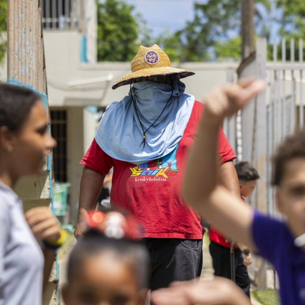 Puerto Rico’s public schools clamor for air conditioning to get relief from record-breaking heat | AP News