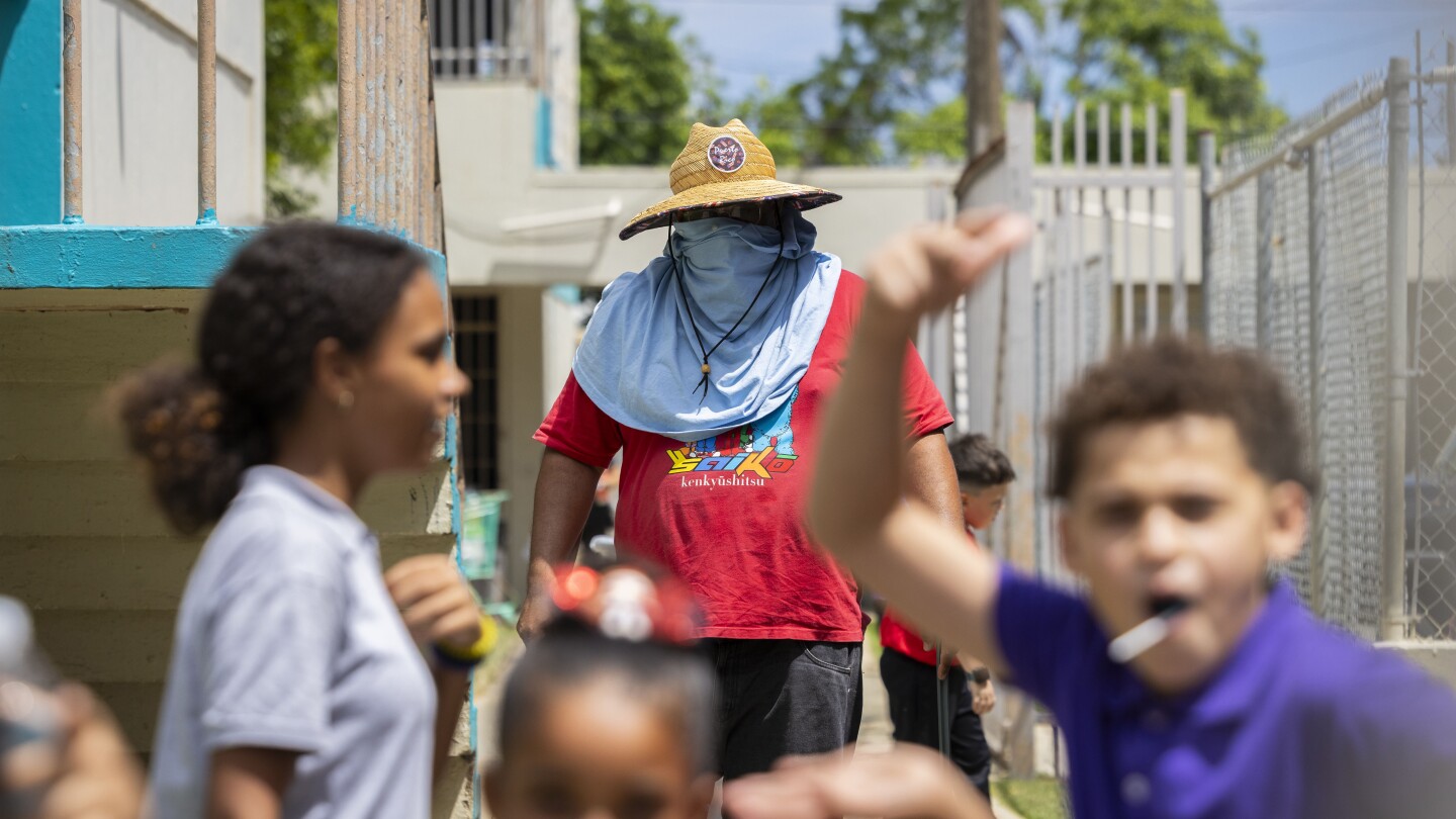 Puerto Rico’s public schools clamor for air conditioning to get relief from record-breaking heat | AP News