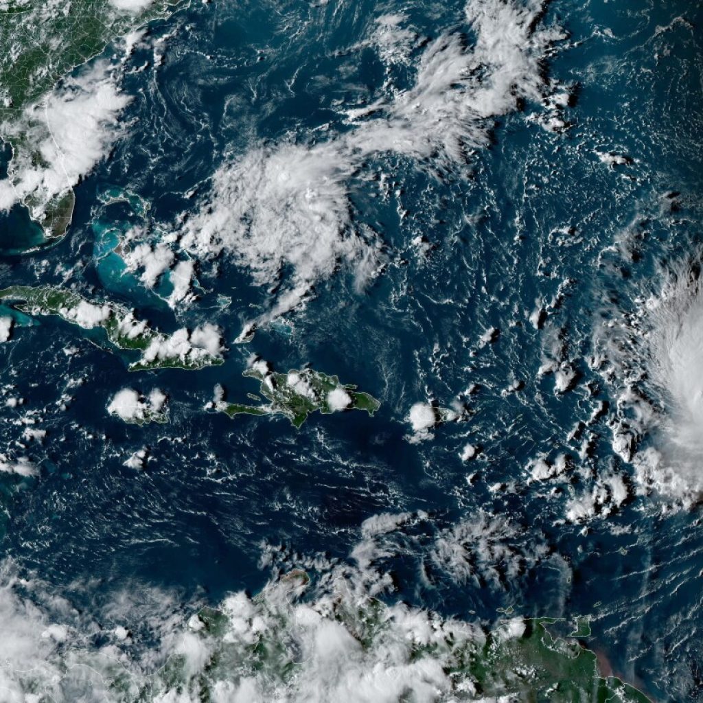 Heavy swells pound northeast Caribbean as Hurricane Lee charges through open waters | AP News