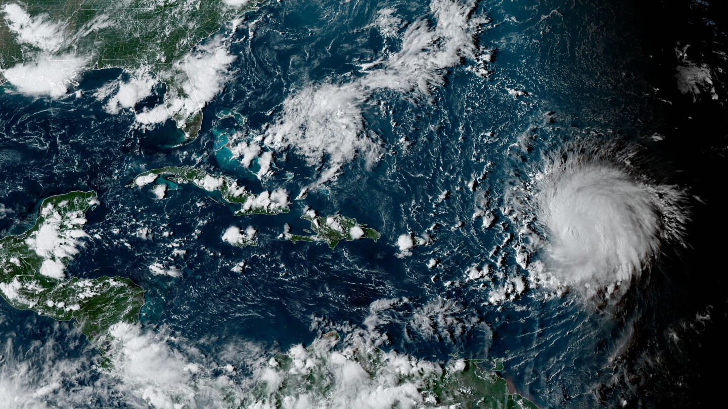 Heavy swells pound northeast Caribbean as Hurricane Lee charges through open waters | AP News