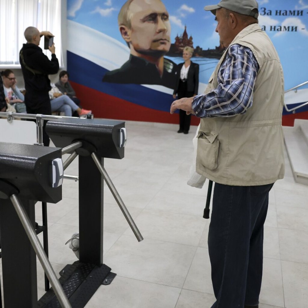 Sabotage attempts reported at polling stations in occupied Ukraine as Russia holds local elections | AP News