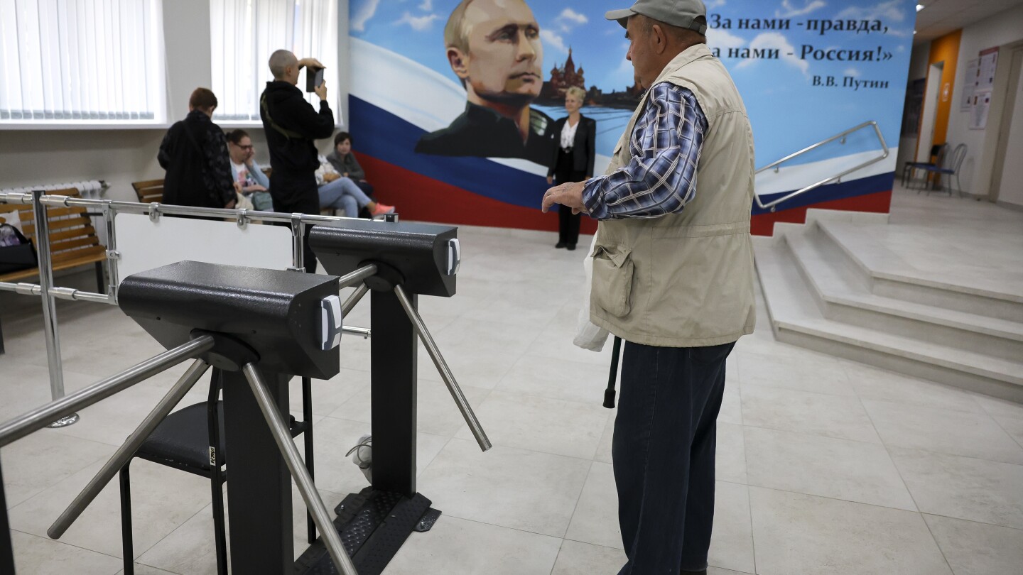 Sabotage attempts reported at polling stations in occupied Ukraine as Russia holds local elections | AP News