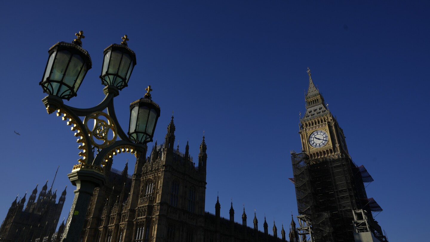 UK resists calls to label China a threat following claims a Beijing spy worked in Parliament | AP News