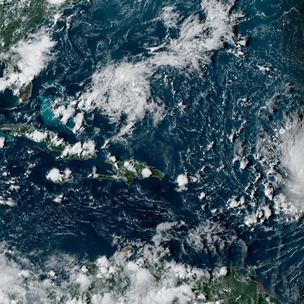 Hurricane Lee generates big swells along northern Caribbean while it churns through open waters | AP News