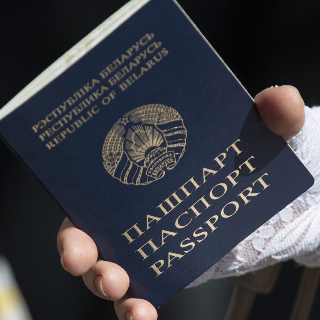 Lithuania to issue special passports to Belarus citizens staying legally in the Baltic country | AP News