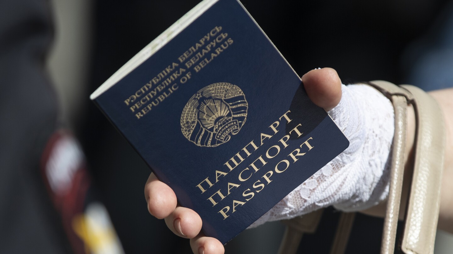 Lithuania to issue special passports to Belarus citizens staying legally in the Baltic country | AP News