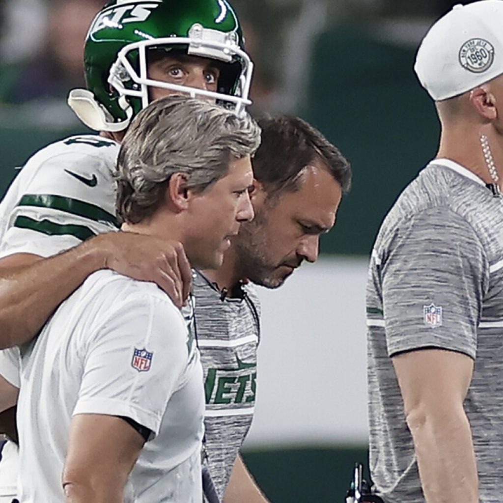 Aaron Rodgers injures ankle in debut with the New York Jets | AP News