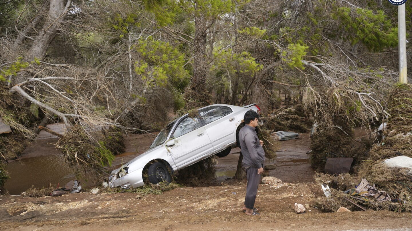 Rescue teams retrieve hundreds of bodies in Derna, one of the Libyan cities devastated by floods | AP News