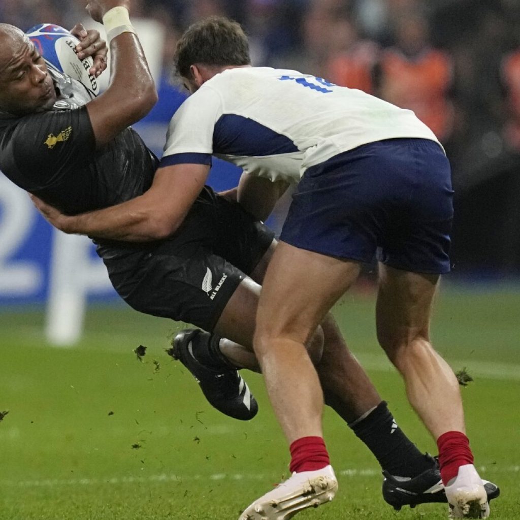 AP PHOTOS: Blood, sweat and tears on the opening weekend of the Rugby World Cup in France | AP News