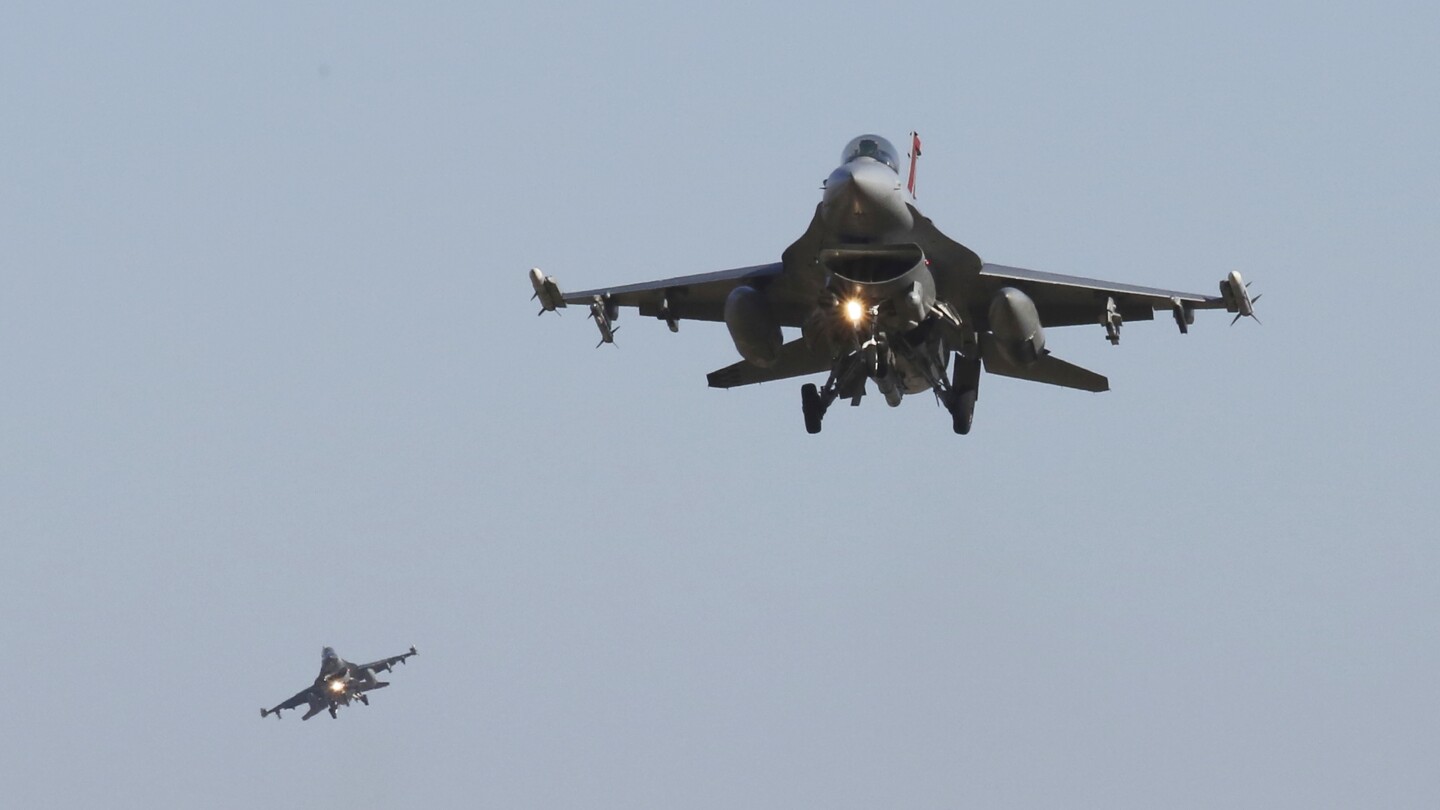 Ukrainian pilots could be flying F-16s in three months, Air National Guard head says | AP News