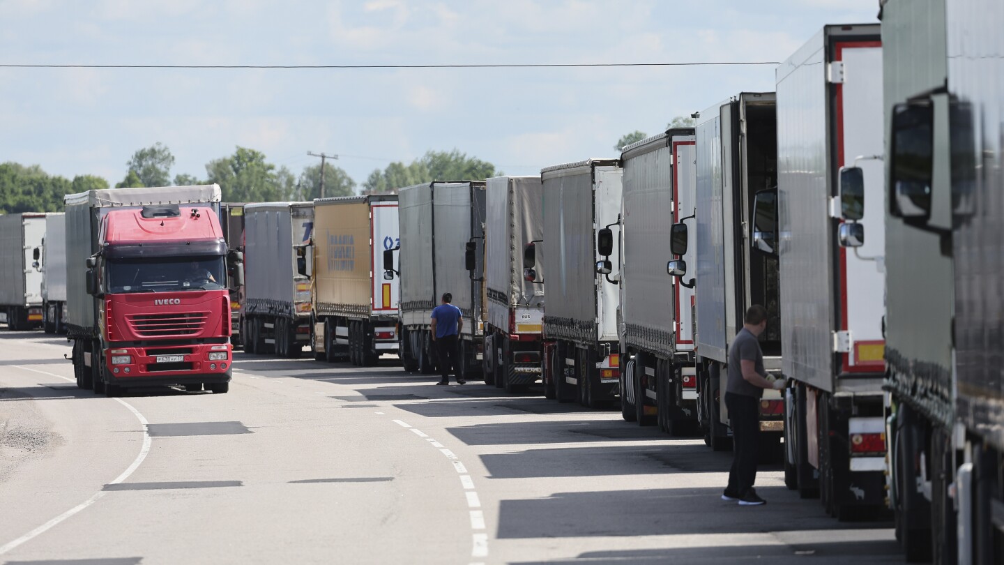 Baltic states ban vehicles with Russian license plates in line with EU sanctions interpretation | AP News