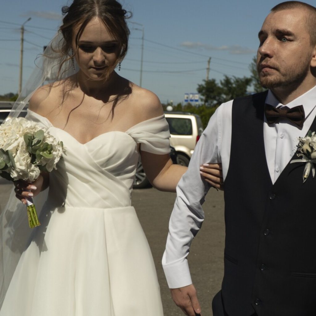 He couldn’t see his wedding. But this war-blinded Ukrainian soldier cried with joy at new love | AP News