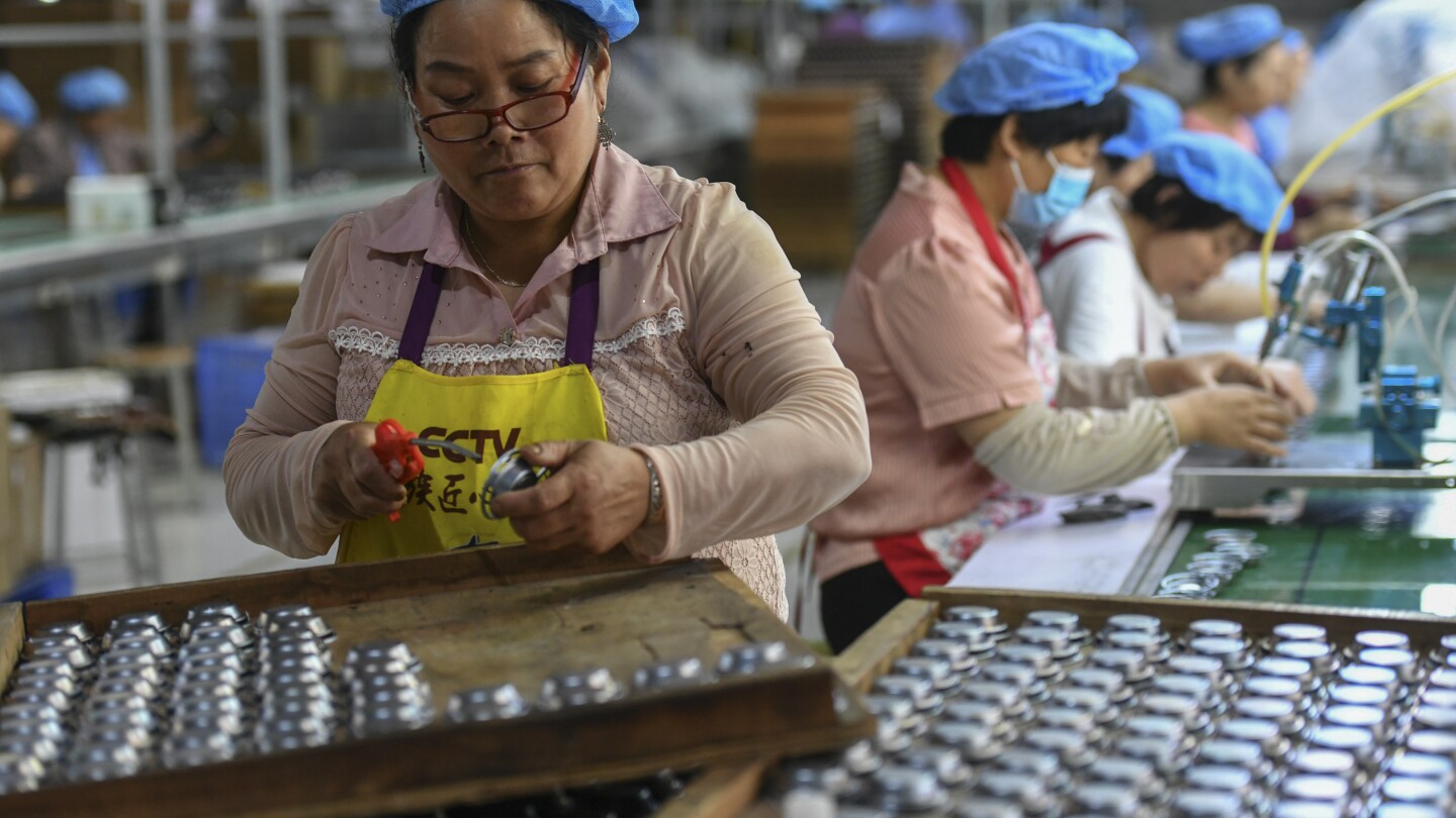 China economic data show signs slowdown may be easing, as central bank acts to support growth | AP News