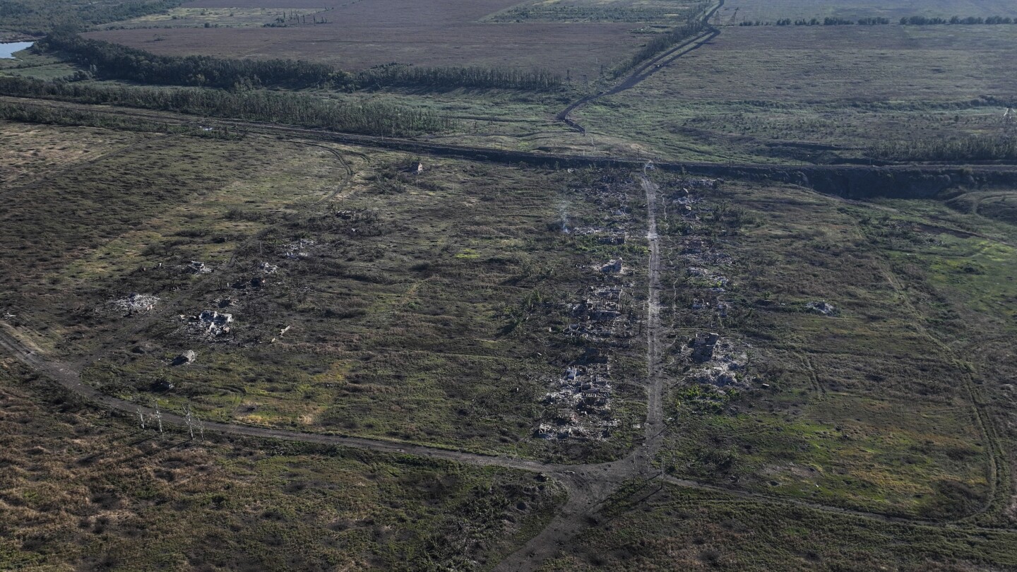 Ukrainian forces reclaim a village in the east as part of counteroffensive | AP News