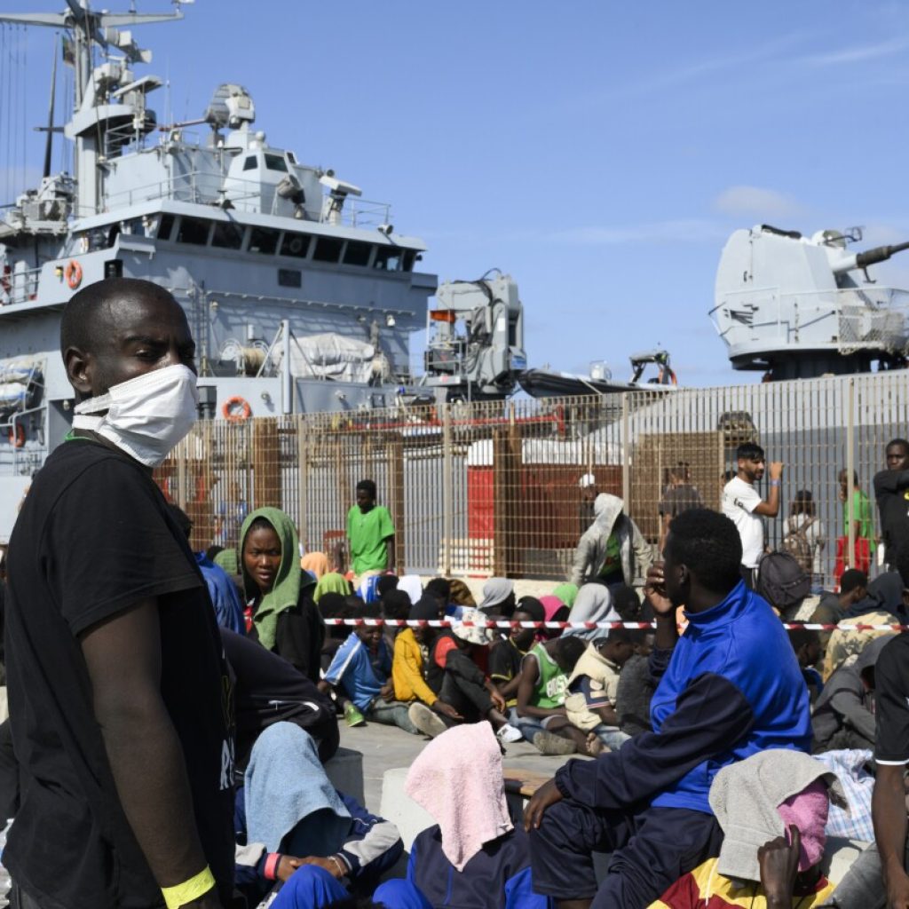 What’s behind the surge in migrant arrivals to Italy? | AP News