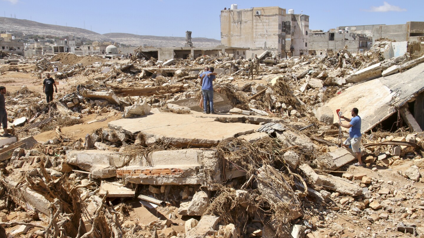 Dozens of Syrians are among the missing in catastrophic floods in Libya, a war monitor says | AP News