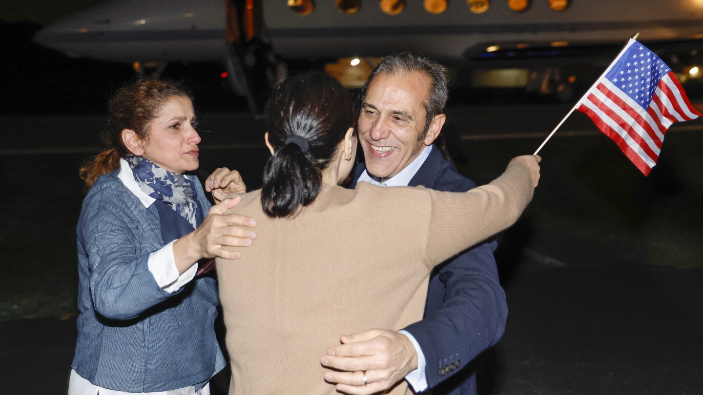 Americans detained for years in Iran arrive in US after their release. Follow the latest | AP News