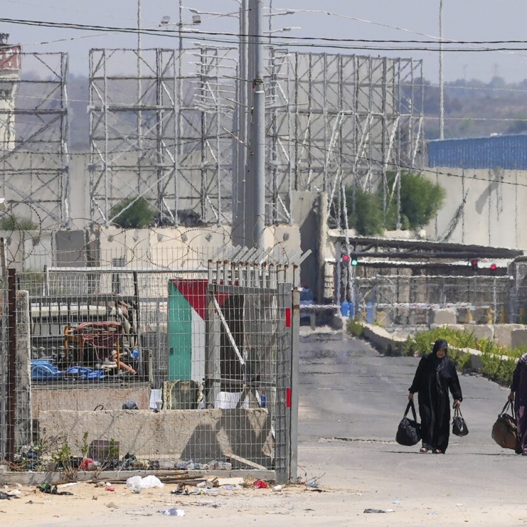 Israel shuts down main crossing with Gaza after outbreak of border violence | AP News