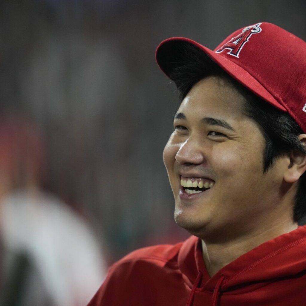 Shohei Ohtani has elbow surgery. His doctor expects he will return by opening day ’24 and pitching by ’25 | AP News