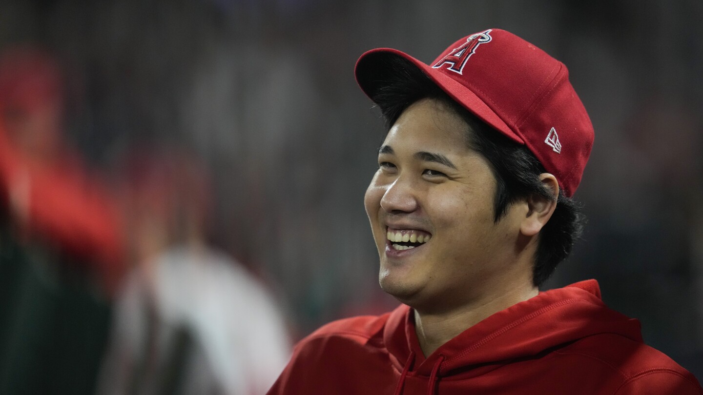 Shohei Ohtani has elbow surgery. His doctor expects he will return by opening day ’24 and pitching by ’25 | AP News