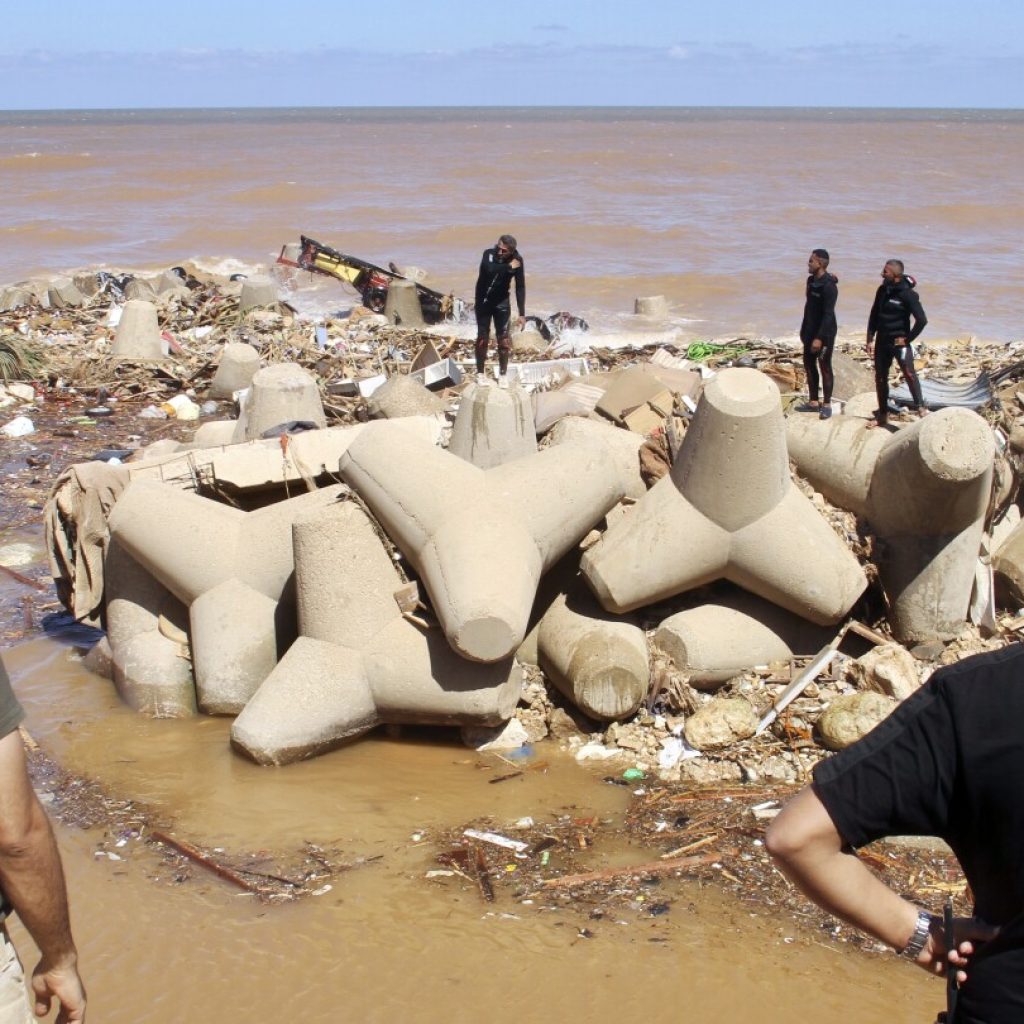 Communication outage hits flood-stricken city in Libya, further complicating search efforts | AP News