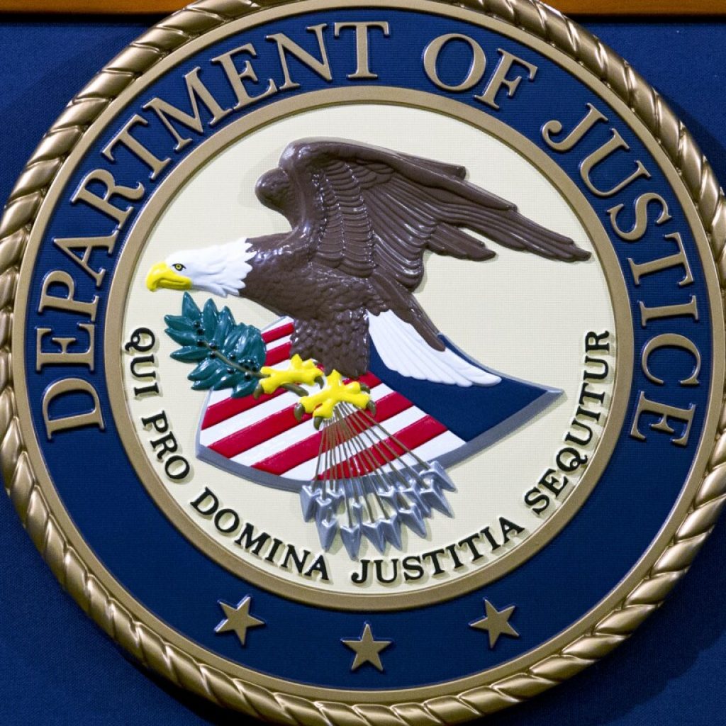 US contractor originally from Ethiopia arrested on espionage charges, Justice Department says | AP News