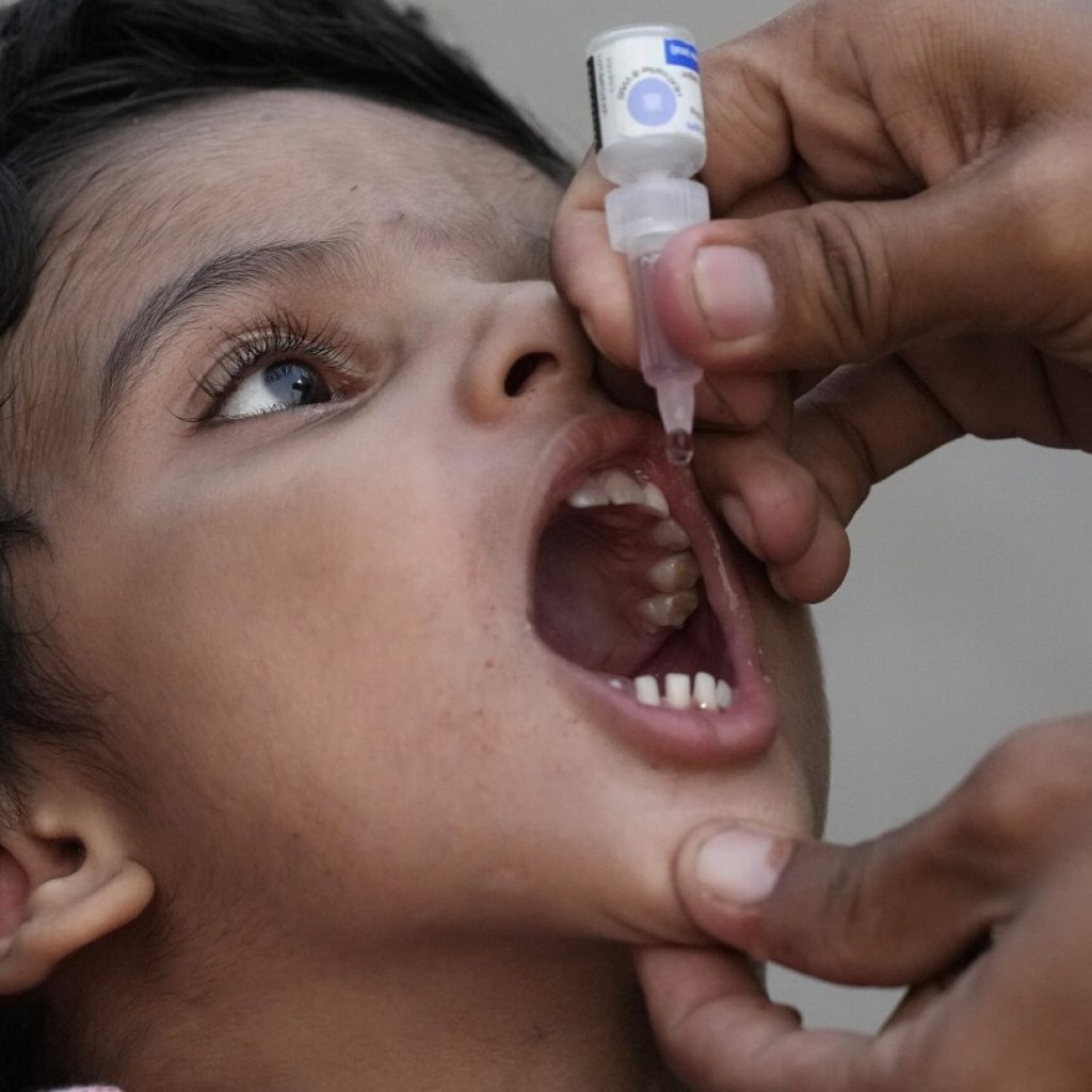 Pakistan officials consider a new way to boost polio vaccination: prison | AP News