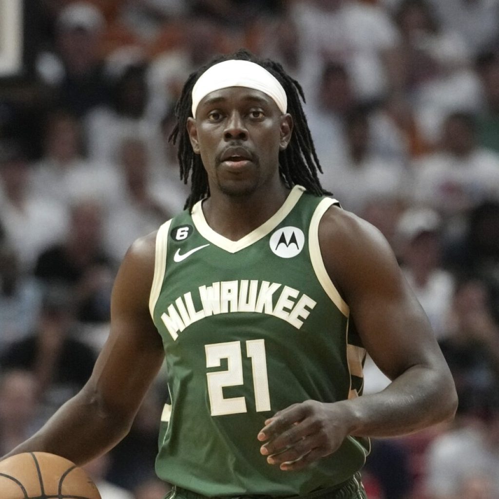 Jrue Holiday being traded to Boston, AP source says, as Portland continues making moves | AP News