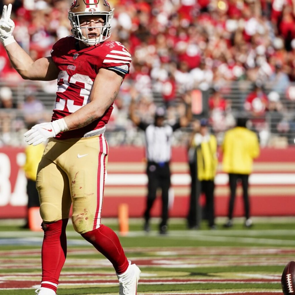 McCaffrey scores 4 TDs to lead the 49ers past the Cardinals 35-16 | AP News