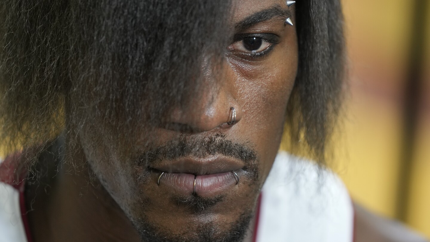 Jimmy Butler: See photos of his new look, hair, at Media Day | AP News