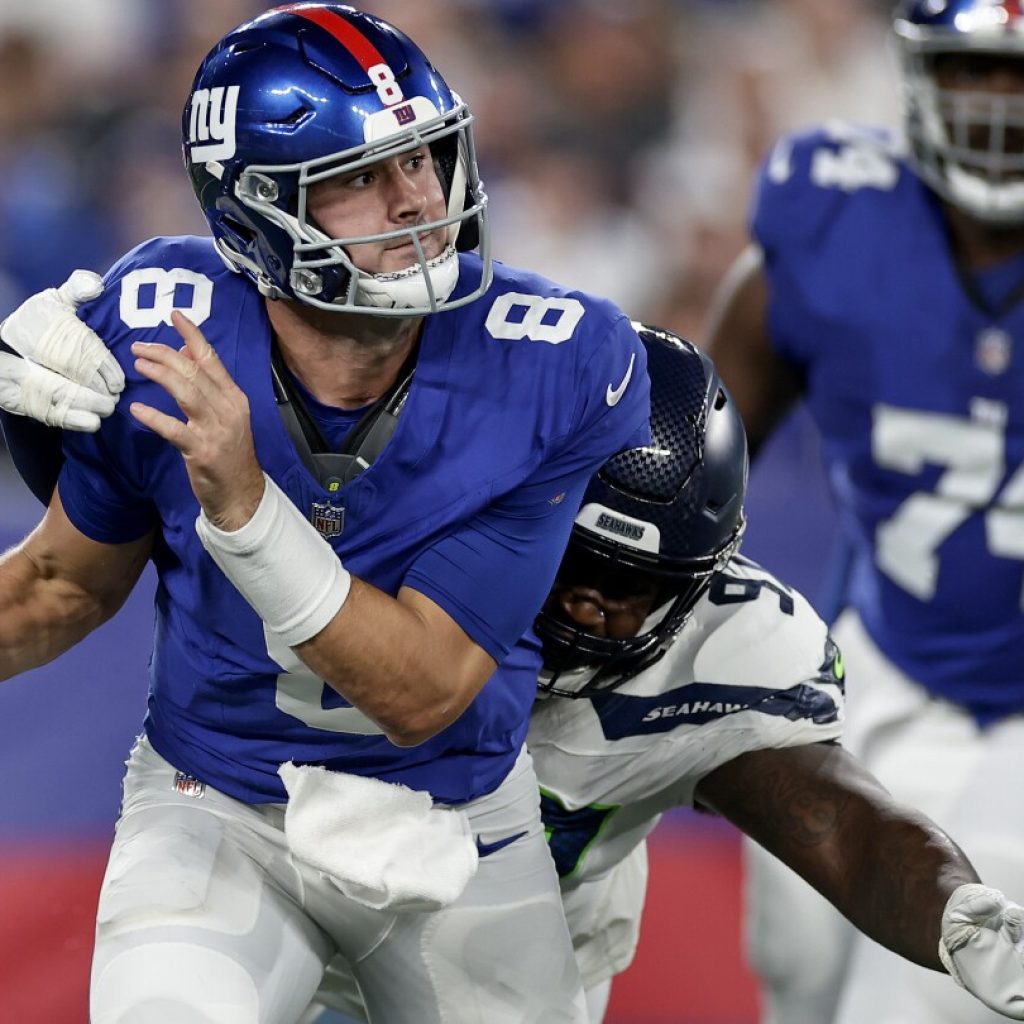 Daniel Jones sacked 10 times as Giants show little in 24-3 loss to the Seattle Seahawks | AP News